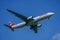 Swiss Air Airbus A330 descends for landing at JFK International Airport in New York