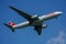 Swiss Air Airbus A330 descends for landing at JFK International Airport in New York