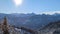 Swiss Alpine in snow on a sunny winter day, pan shot