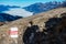 Swiss Alps above Walensee: Shadow of a hiker and view into a valley full of fog