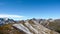 Swiss Alps mountain landscape in the Davos region in late autumn with first snow on the high mountain peaks