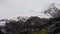 Swiss Alps snow background time-lapse. snowy mountains and clouds passing close