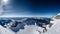 Swiss Alps: Snow-Capped Peaks, Vivid Blue Sky, Breathtaking Mountain Landscape