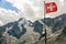 Swiss flag with Dolent glacier in Swiss Alps