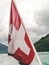 A Swiss flag on the rear of a ferry on Lake Lucerne