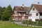 Swiss half-timbered houses in rural landscape