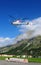 A Swiss Helicopter of Air Engadin is being prepared for the tran