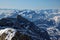 Swiss mountain landscape in snow photographed from bird`s eye view, cloudless sky, daytime, without people