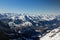 Swiss mountain landscape in the snow photographed from bird`s eye view, cloudless sky with extreme visibility, daytime, without