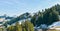 Swiss mountain railways and spring panoramic view of snow-capped mountains in the Alps