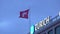 Swiss national flag flapping on top of building in Zurich, travel to Switzerland