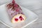 Swiss roll biscuit with raspberries