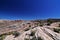 A switchback corner among the rock monuments and red sandstone outcroppings of Moab utah