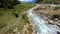 Switzerland alp alpine drone aerial glide fly through and over river. Mountain surfing swiss alps pass Sustenpass