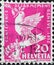 Switzerland - Circa 1932: a postage stamp printed in the Switzerland showing a dove of peace on a broken sword for the disarmament