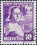 Switzerland - Circa 1936: a postage stamp printed in the Switzerland showing a historical woman portrait with hat in the tradition