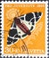 Switzerland - Circa 1955 : a postage stamp printed in the swiss showing the butterfly yellow bear wood wasp Rhyparia flava on da