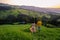 Switzerland countryside, Ebnat Kappel, Sankt-Gallen, Switzerland, couple man an woman looking at sunset outside there