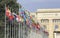 Switzerland; Geneva; March 9, 2018; Two rows of the United Nations member states flags with the United Nations Office in Geneva i