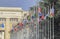 Switzerland; Geneva; March 9, 2018; Two rows of the United Nations member states flags with the United Nations Office in Geneva i