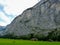 Switzerland, Lauterbrunnen, SCENIC VIEW OF FIELD BY MOUNTAINS AG