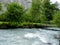 Switzerland, Lauterbrunnen, SCENIC VIEW OF RIVER FLOWING IN FORE