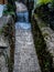 Switzerland, Lauterbrunnen, VIEW OF WATERFALL ALONG WALL