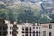 Switzerland, St.Moritz - June 6, 2023: city landscape with buildings, hills and trees, private houses, cottages