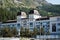 Switzerland, St.Moritz - June 6, 2023: city landscape with buildings, hills and trees, private houses, cottages