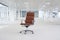 Swivel chair in empty office space
