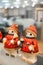 Swo Santa claus happy smiling statue standing together on cold d