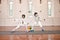 Sword, sport and men fight in fencing training, exercise or workout in a hall. Martial arts, match and fencers or people