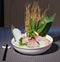 Swordfish sashimi with radishes, lemon and ginger gari