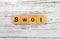 SWOT word made with wooden blocks concept