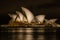 Sydney, Australia - 2019: Sydney Opera House at night, one of the most famous and distinctive buildings in the world