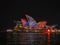SYDNEY, AUSTRALIA - JUNE 3 2015: psychedelic sydney opera house brightly lit with multicolours and patterns