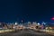 Sydney City night skyline viewed from Pyrmont Bridge through Darling Harbour