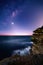 Sydney coast by night with starry milky way sky