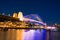 Sydney Harbour Bridge illuminating the night skies viewed from the Rocks on Australia Day