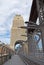 Sydney Harbour Bridge with tourists enjoying view on the sidewalk.