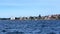 Sydney Harbour foreshore on a party cloudy sky. viewed from ferry on way to Manly, NSW Australia