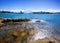 Sydney Harbour with nice rocks in the foreground and the beautiful harbour foreshore as a backdrop NSW Australia