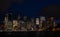 Sydney harbour skyline at night as seen from the sea