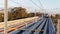 Sydney, NSW, Australia - 4 October, 2019: Modern driverless metro train arriving at platform in afternoon sunshine with