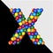 The symbol of the balls of the colors of the rainbow on a transparent background. 3d capital letter X