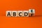 Symbol for basic teaching. Turned a cube and corrected the sequence of letters from `a b c d f` to `a b c d e`. Beautiful oran