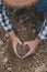 Symbol heart earth day. Handful of dirt hands heart shape. Farm organic earth. Farmer hands soil ground earth dirt garden soil