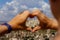 Symbol of heart made up of womens fingers through it is seen Cappadocia