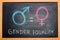 Symbol of male gender is equal to female gender on the blackboard