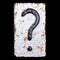 Symbol question mark made of forged metal on the background fragment of a metal surface with cracked rust.